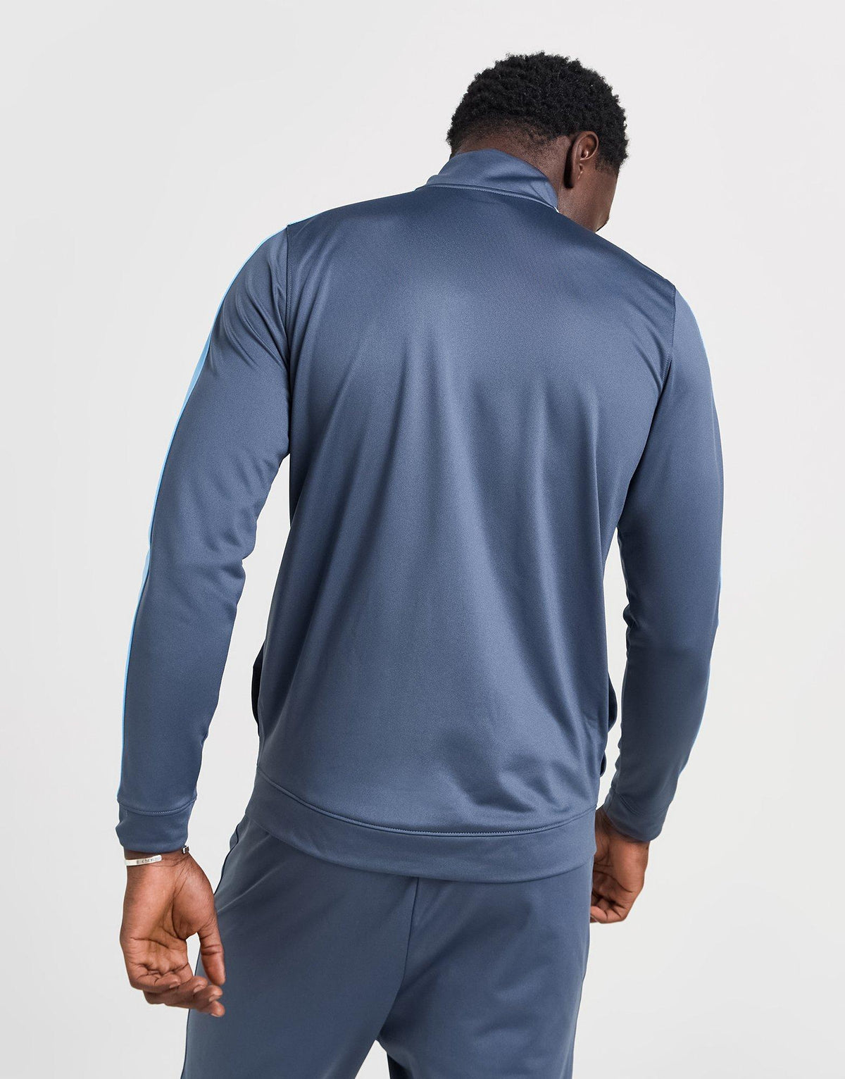 UA Poly Track Top